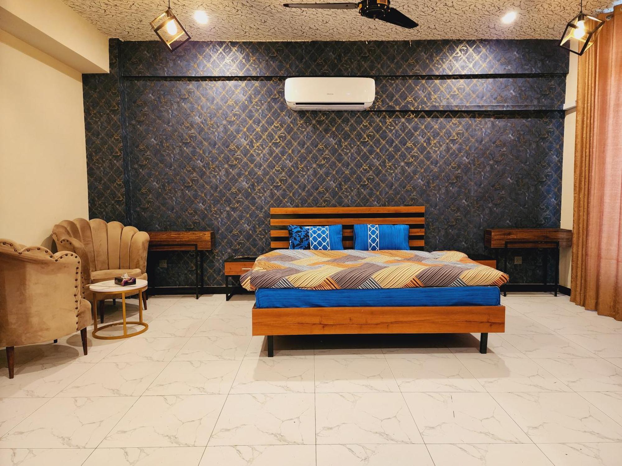 Motorway Majesty Suites Islamabad - Near Islamabad International Airport And Motorway Quarto foto
