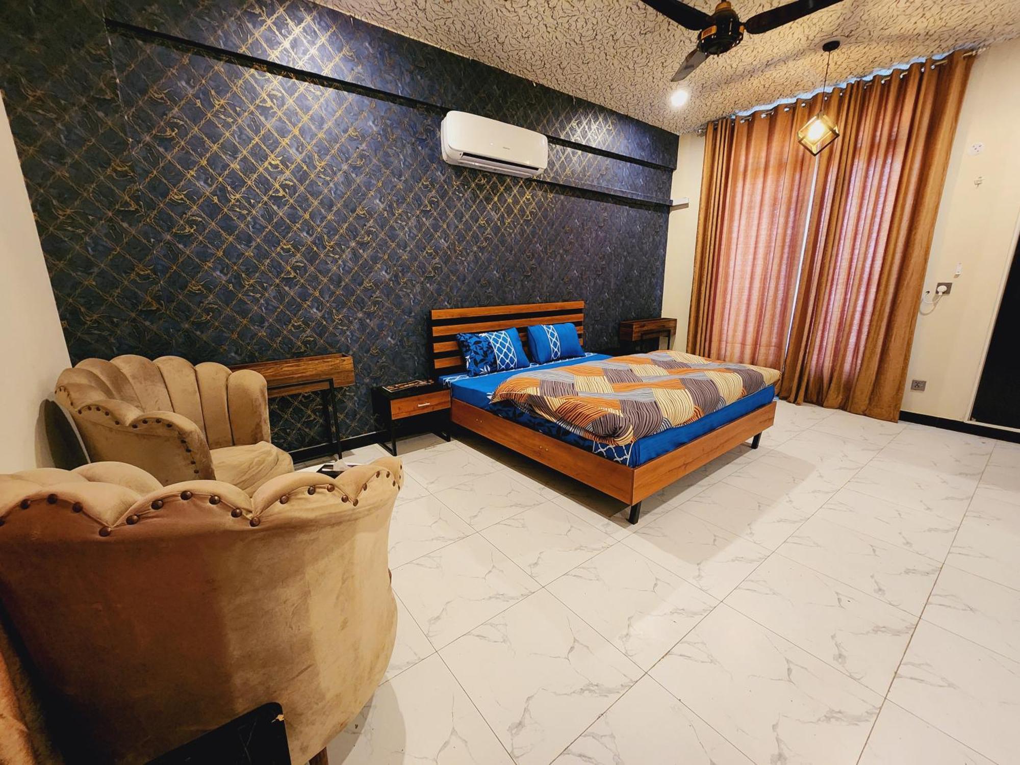 Motorway Majesty Suites Islamabad - Near Islamabad International Airport And Motorway Quarto foto