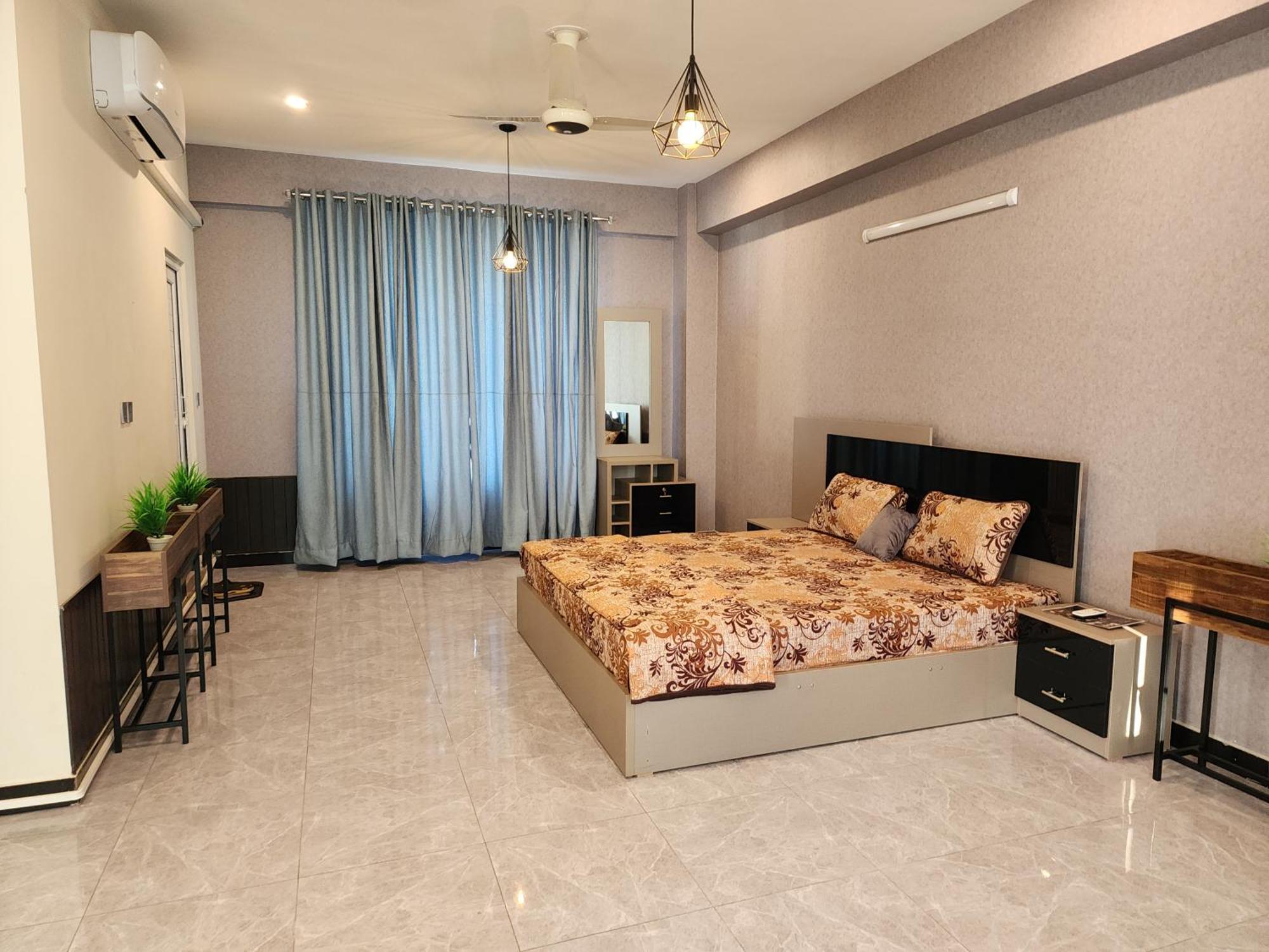 Motorway Majesty Suites Islamabad - Near Islamabad International Airport And Motorway Quarto foto