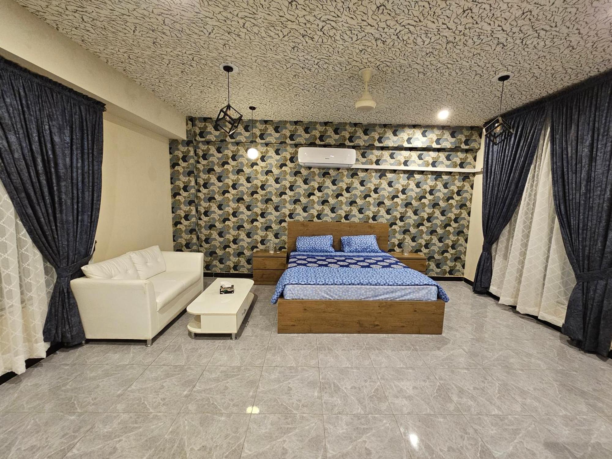 Motorway Majesty Suites Islamabad - Near Islamabad International Airport And Motorway Quarto foto