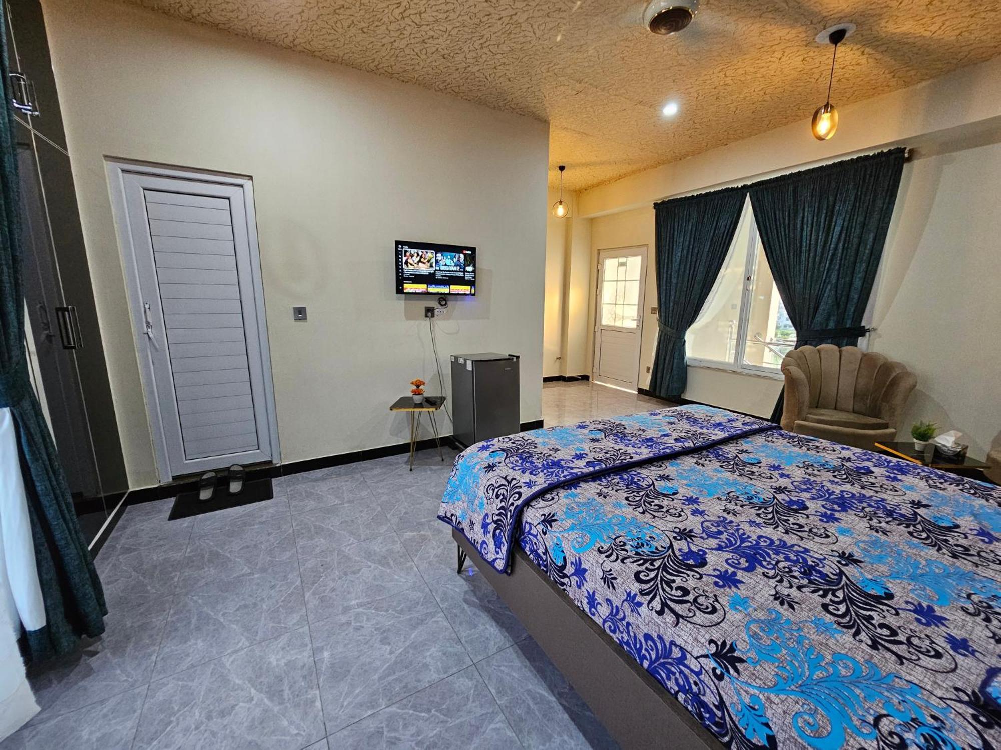 Motorway Majesty Suites Islamabad - Near Islamabad International Airport And Motorway Quarto foto