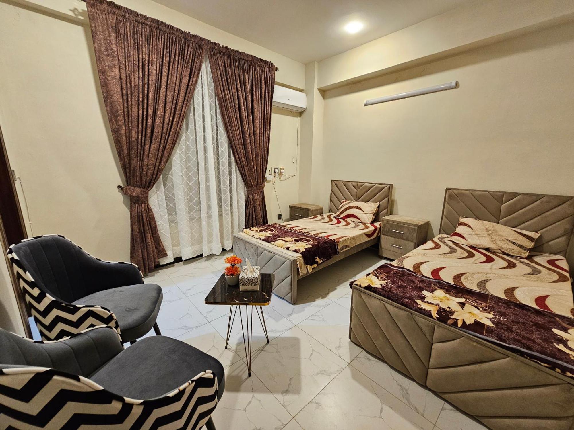 Motorway Majesty Suites Islamabad - Near Islamabad International Airport And Motorway Quarto foto