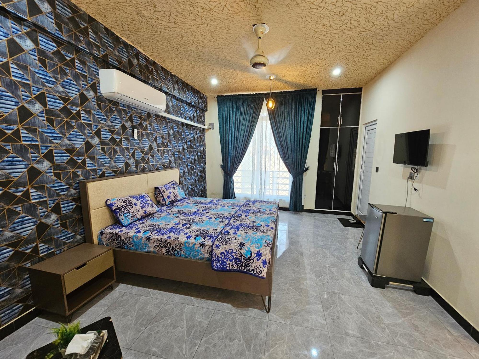 Motorway Majesty Suites Islamabad - Near Islamabad International Airport And Motorway Quarto foto