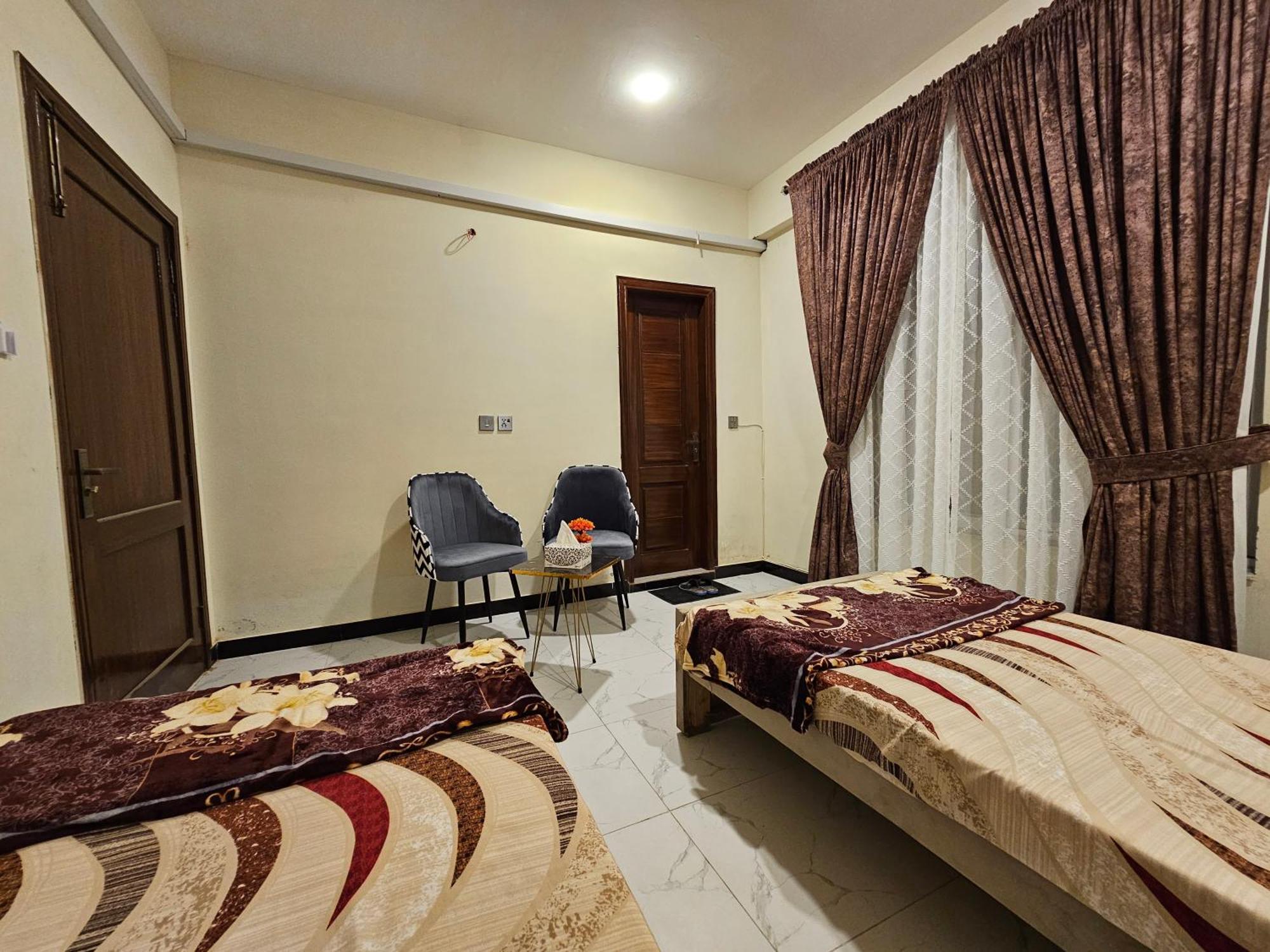 Motorway Majesty Suites Islamabad - Near Islamabad International Airport And Motorway Quarto foto