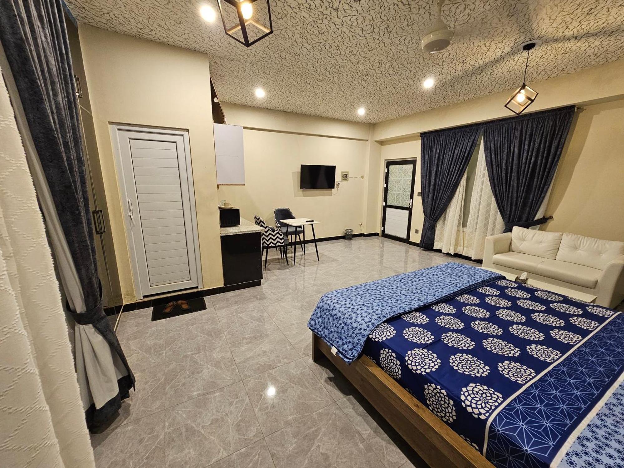 Motorway Majesty Suites Islamabad - Near Islamabad International Airport And Motorway Quarto foto